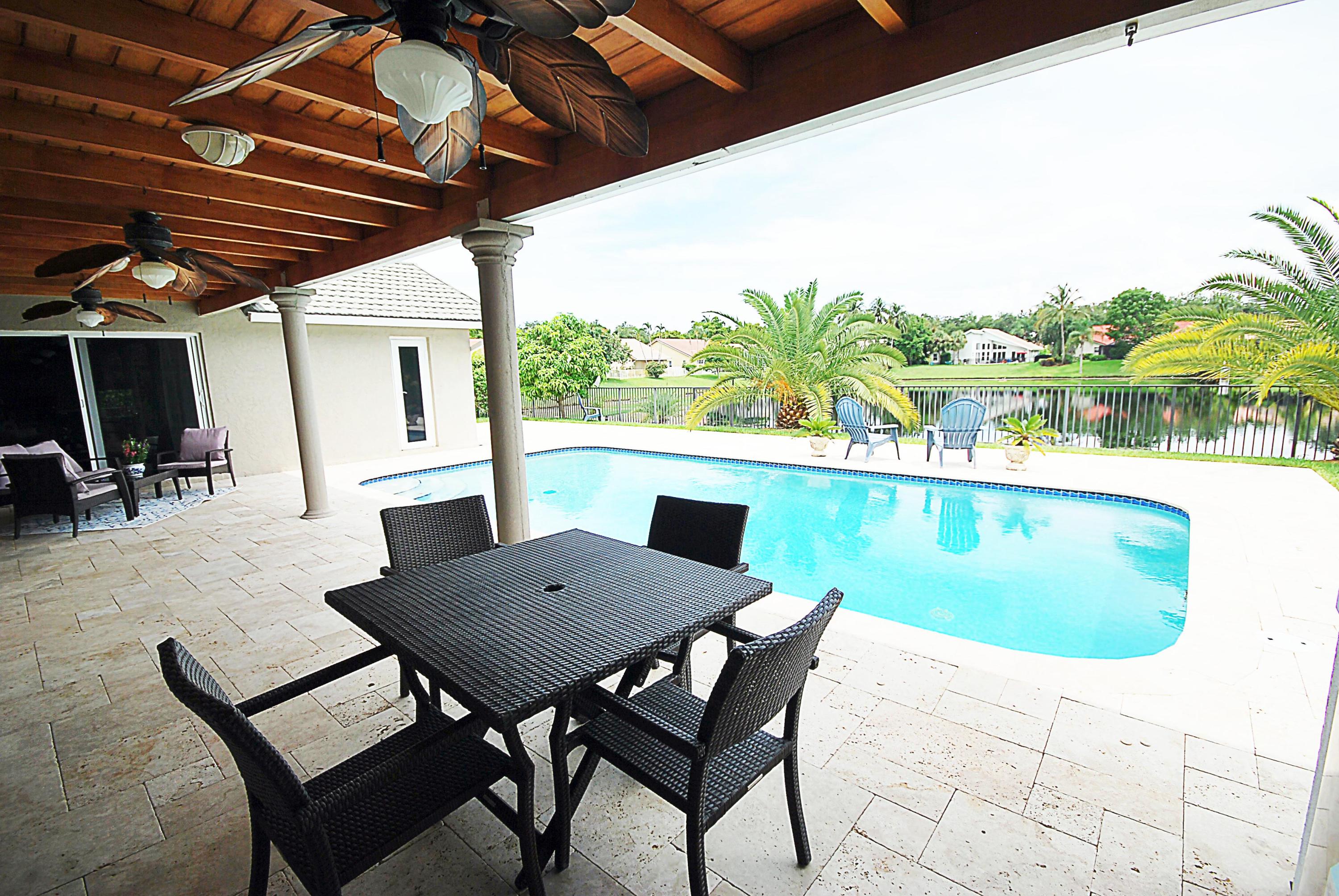 2621 Northwest 39th Street Boca Raton, FL 33434 - Photo 29 of 32 Pool and Lake