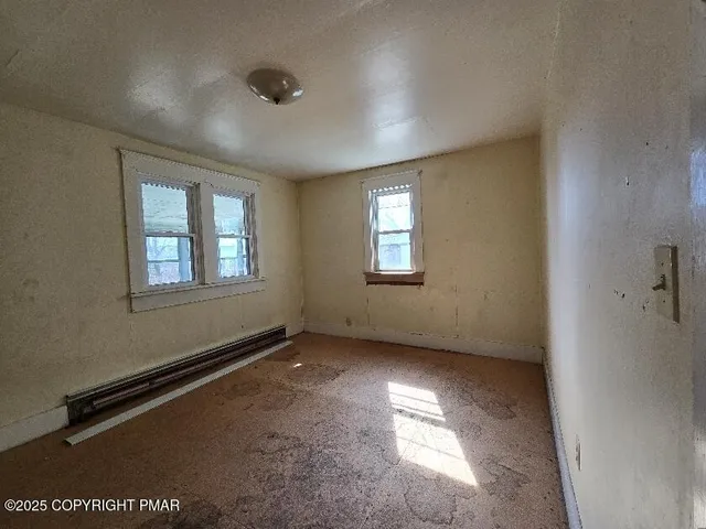 a bathroom with a sink a toilet and bathtub