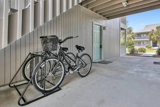 a view of front door with wooden floor