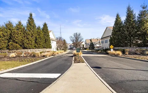 a view of a city street with a building