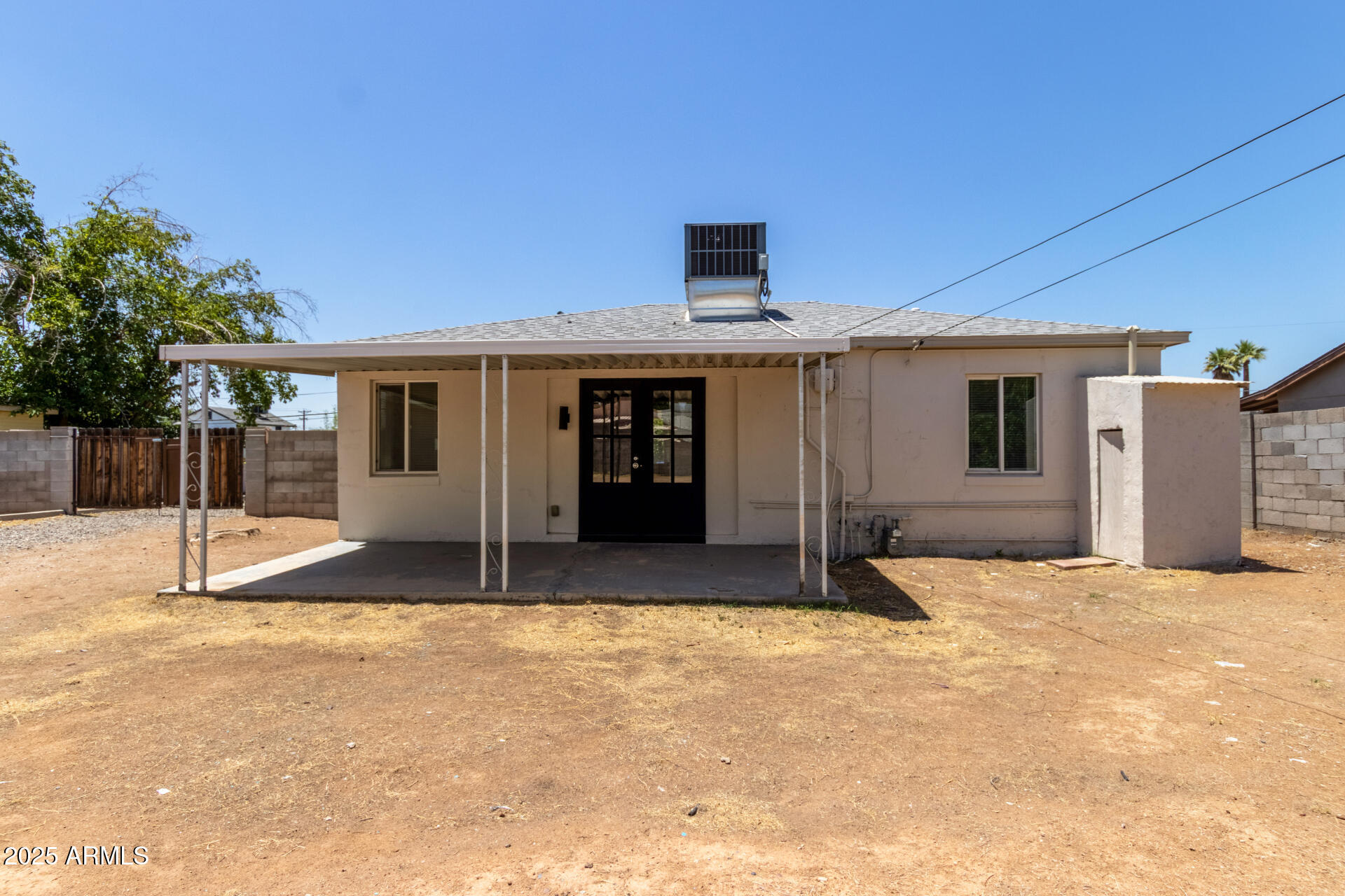 2615 North 29th Place Phoenix, AZ 85008 - Photo 22 of 26 a house with yard in front of it