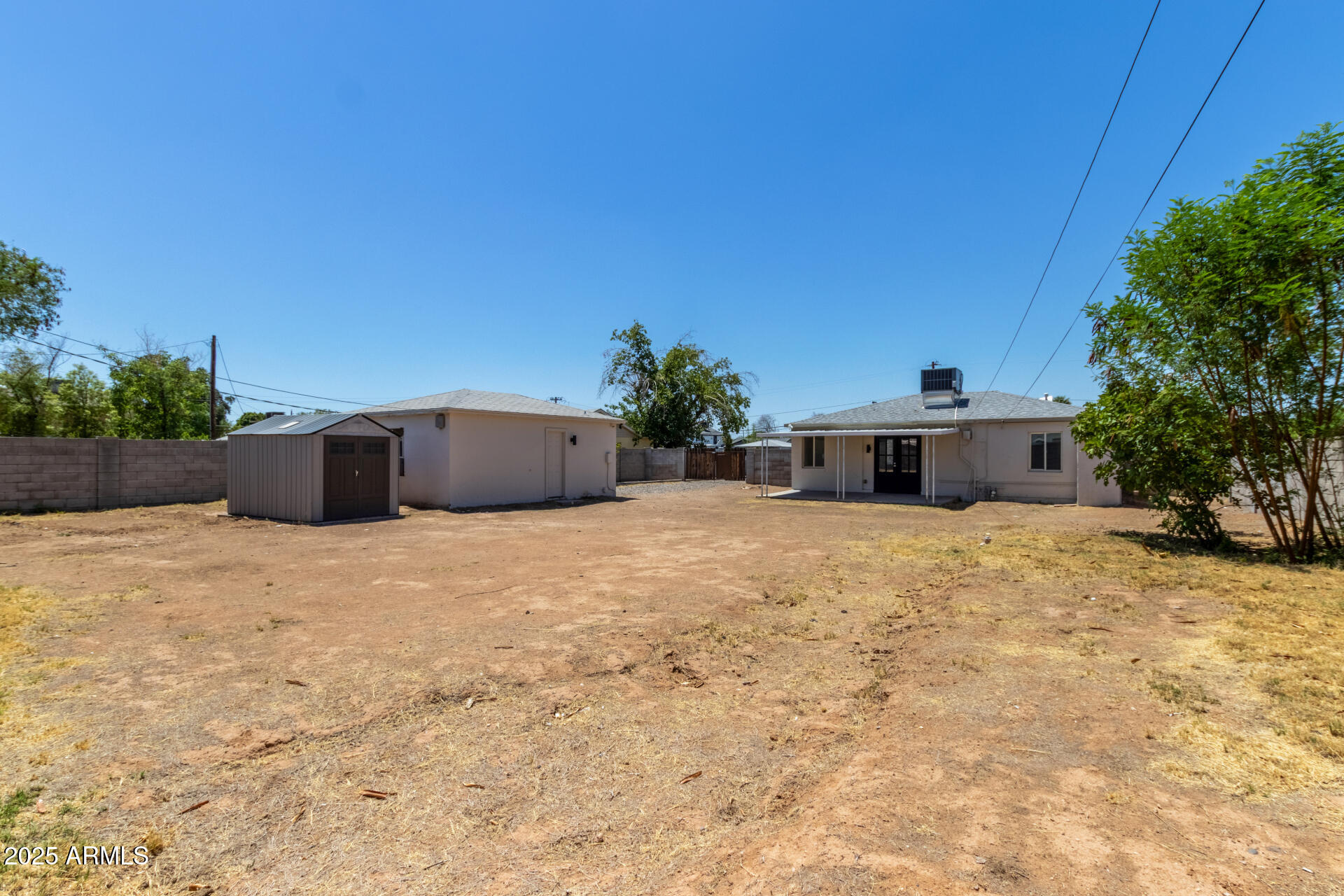 2615 North 29th Place Phoenix, AZ 85008 - Photo 26 of 26 a house with a yard