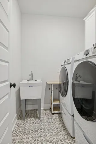 a utility room with dryer and washer