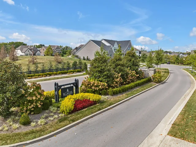 a view of a house with a big yard