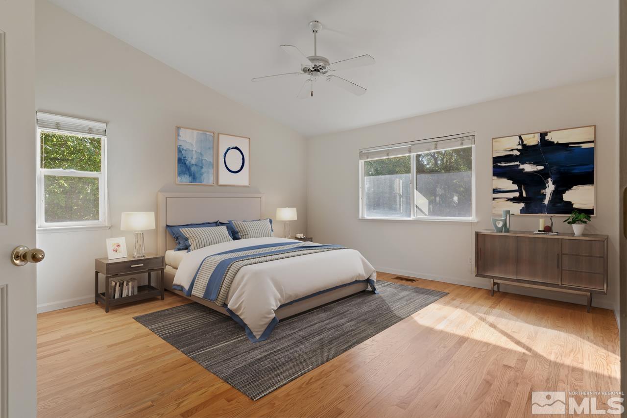 17040 Castle Pine Drive Reno, NV 89511 - Photo 15 of 31 a bedroom with a bed and a dresser