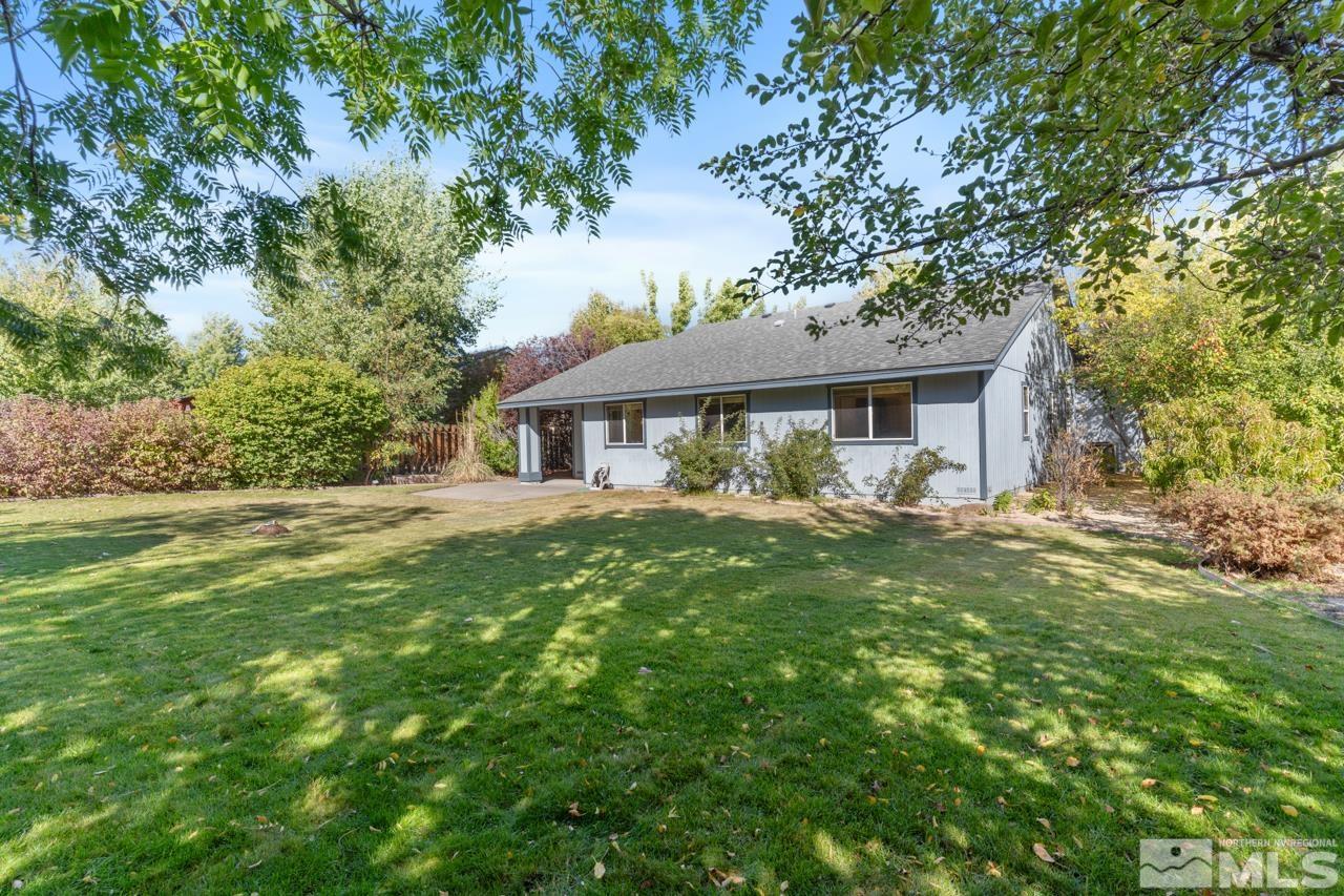 17040 Castle Pine Drive Reno, NV 89511 - Photo 25 of 31 a front view of a house with a garden