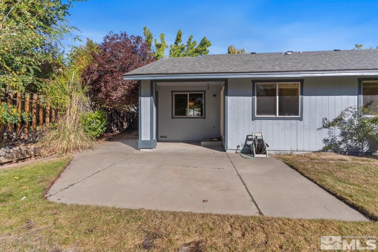 17040 Castle Pine Drive Reno, NV 89511 - Photo 27 of 31 a front view of a house with a yard