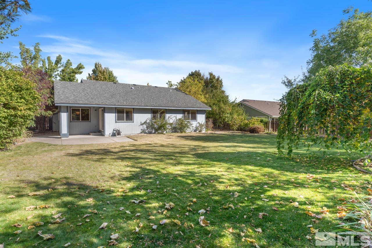17040 Castle Pine Drive Reno, NV 89511 - Photo 31 of 31 a front view of a house with a yard
