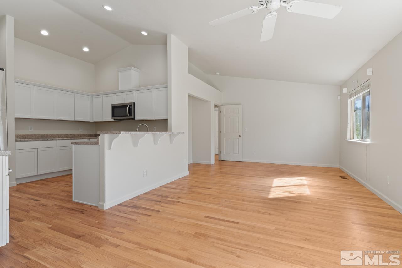 17040 Castle Pine Drive Reno, NV 89511 - Photo 9 of 31 a view of kitchen with microwave and cabinets