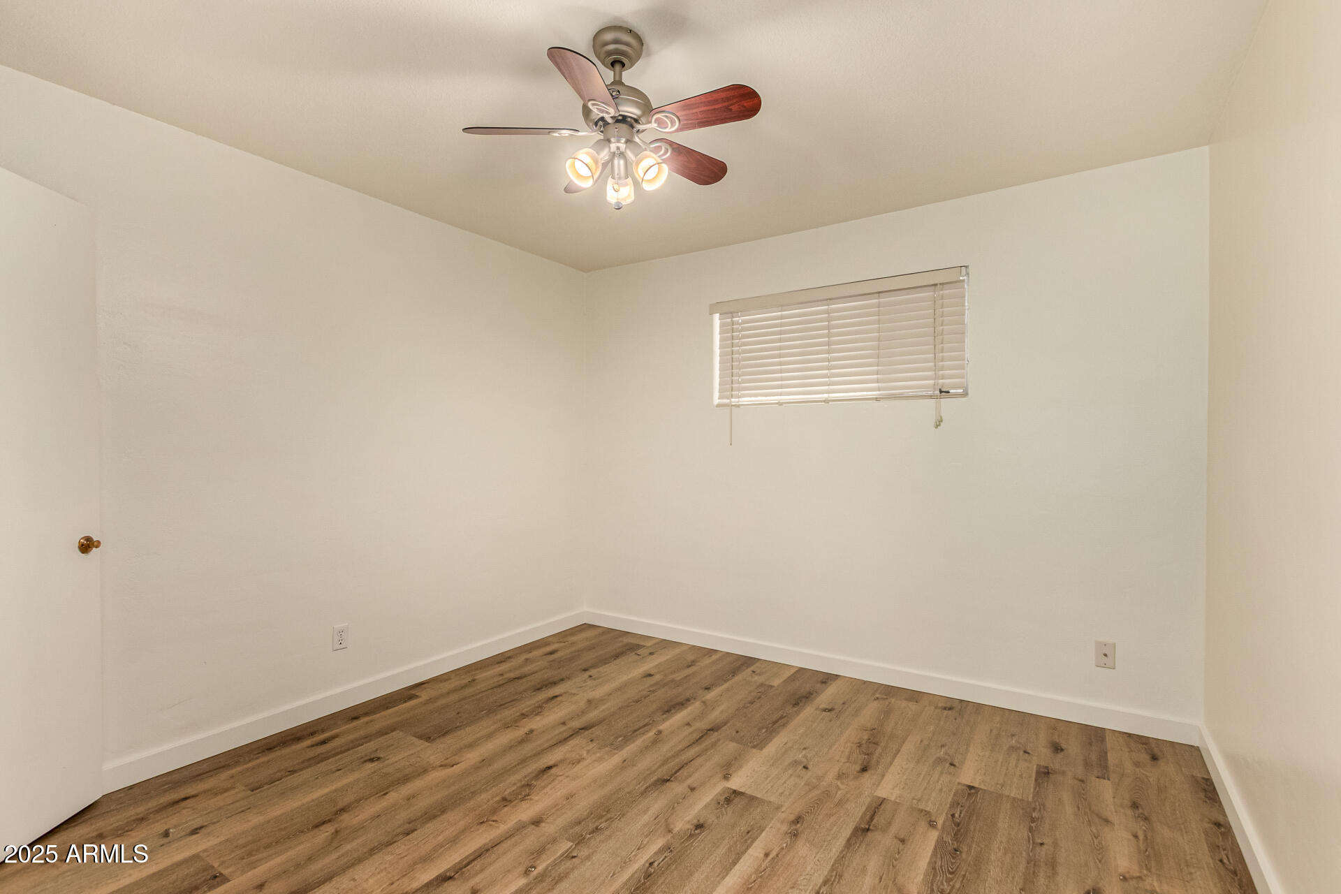 3540 East Montecito Avenue, Unit 1 Phoenix, AZ 85018 - Photo 15 of 26 wooden floor in an empty room