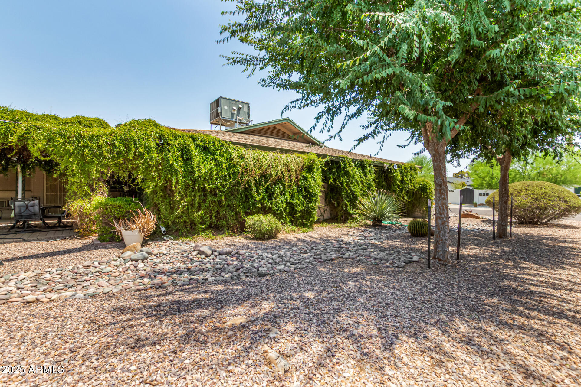 3540 East Montecito Avenue, Unit 1 Phoenix, AZ 85018 - Photo 26 of 26 a view of a house with a yard