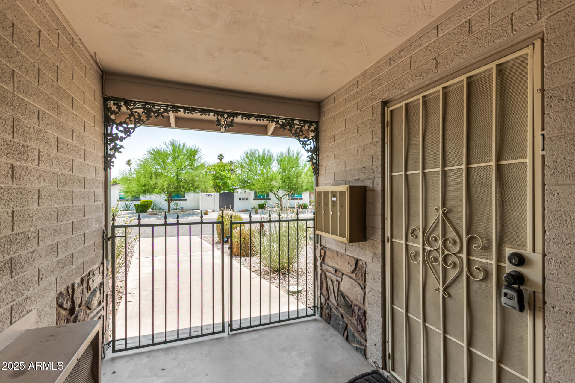 3540 East Montecito Avenue, Unit 1 Phoenix, AZ 85018 - Photo 4 of 26 a view of a porch