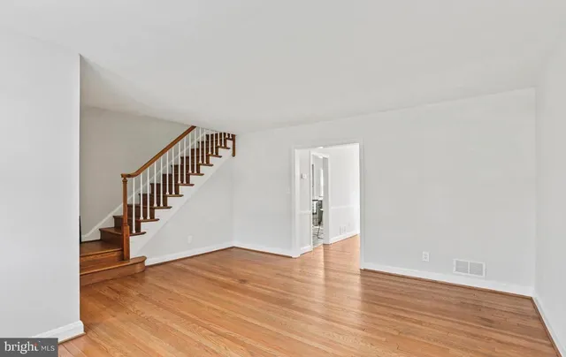 a view of entryway with wooden floor