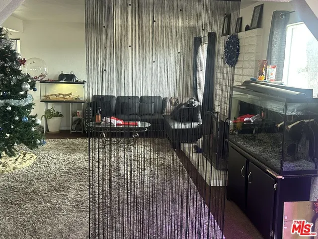 a bathroom with a sink a mirror and a shower