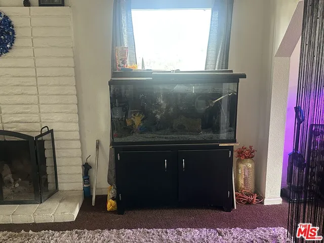 a living room with a fireplace