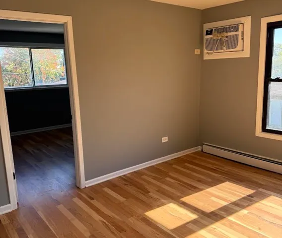 a view of an empty room and window