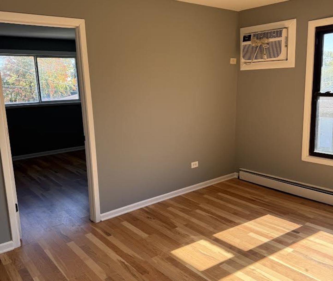 7719 South Roberts Road Bridgeview, IL 60455 - Photo 7 of 7 a view of an empty room and window
