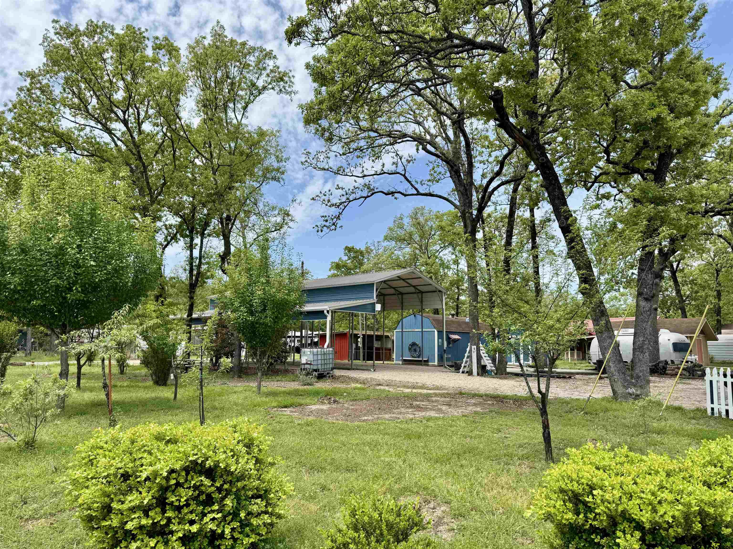 a view of a house with a back yard