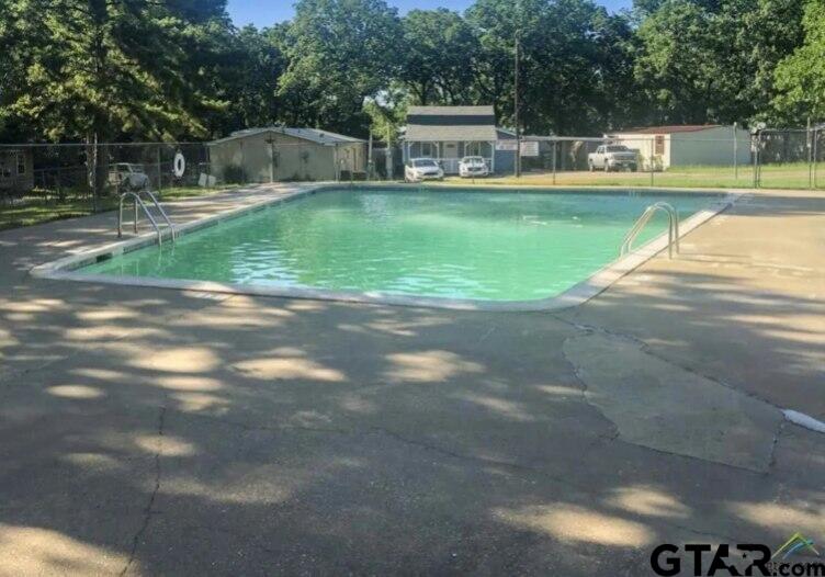 107 Private Road 7713 Emory, TX 75440 - Photo 21 of 22 a view of a house with a yard
