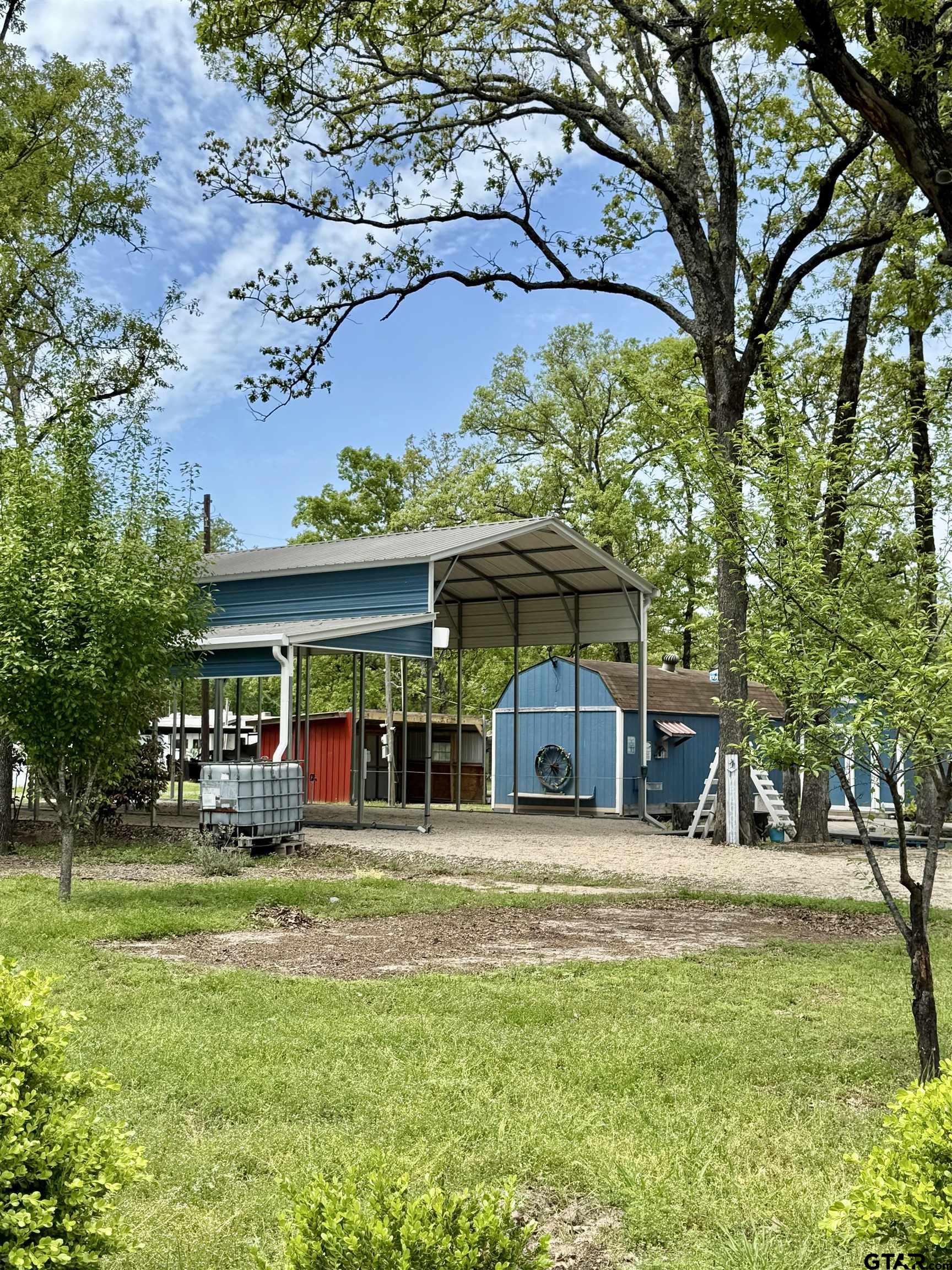 107 Private Road 7713 Emory, TX 75440 - Photo 22 of 22 a view of a house with a yard