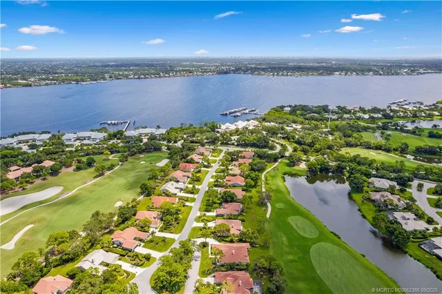 a view of a lake with a city