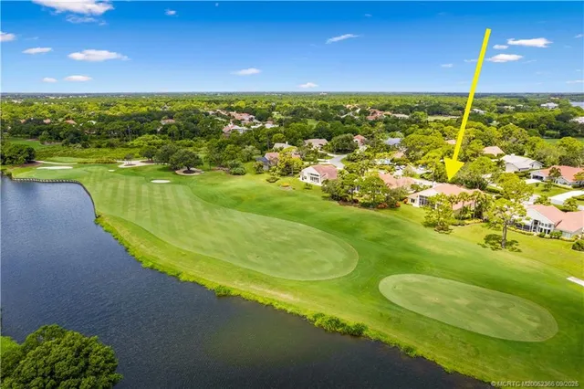 a view of an ocean and a mountain