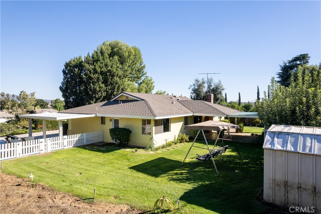 12952 Club Drive Redlands, CA 92373 - Photo 13 of 35 a front view of a house with garden