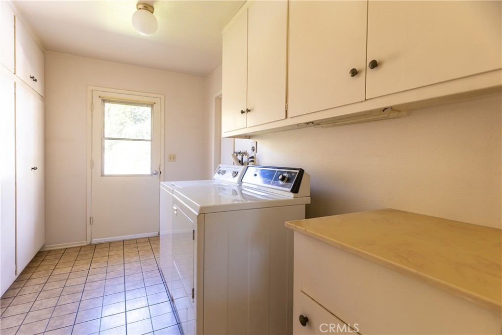 12952 Club Drive Redlands, CA 92373 - Photo 22 of 35 a utility room with dryer and washer