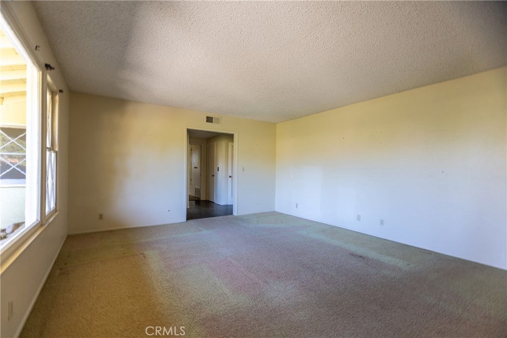12952 Club Drive Redlands, CA 92373 - Photo 27 of 35 an empty room with windows