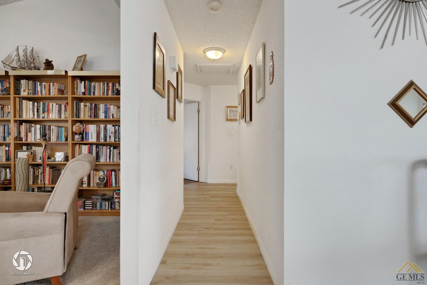 Undisclosed Address Bakersfield, CA 93312 - Photo 12 of 33 a view of a hallway with seating space