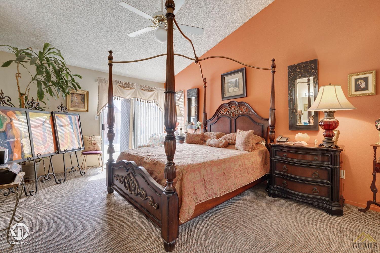 Undisclosed Address Bakersfield, CA 93312 - Photo 13 of 33 a bed sitting in a room next to a window