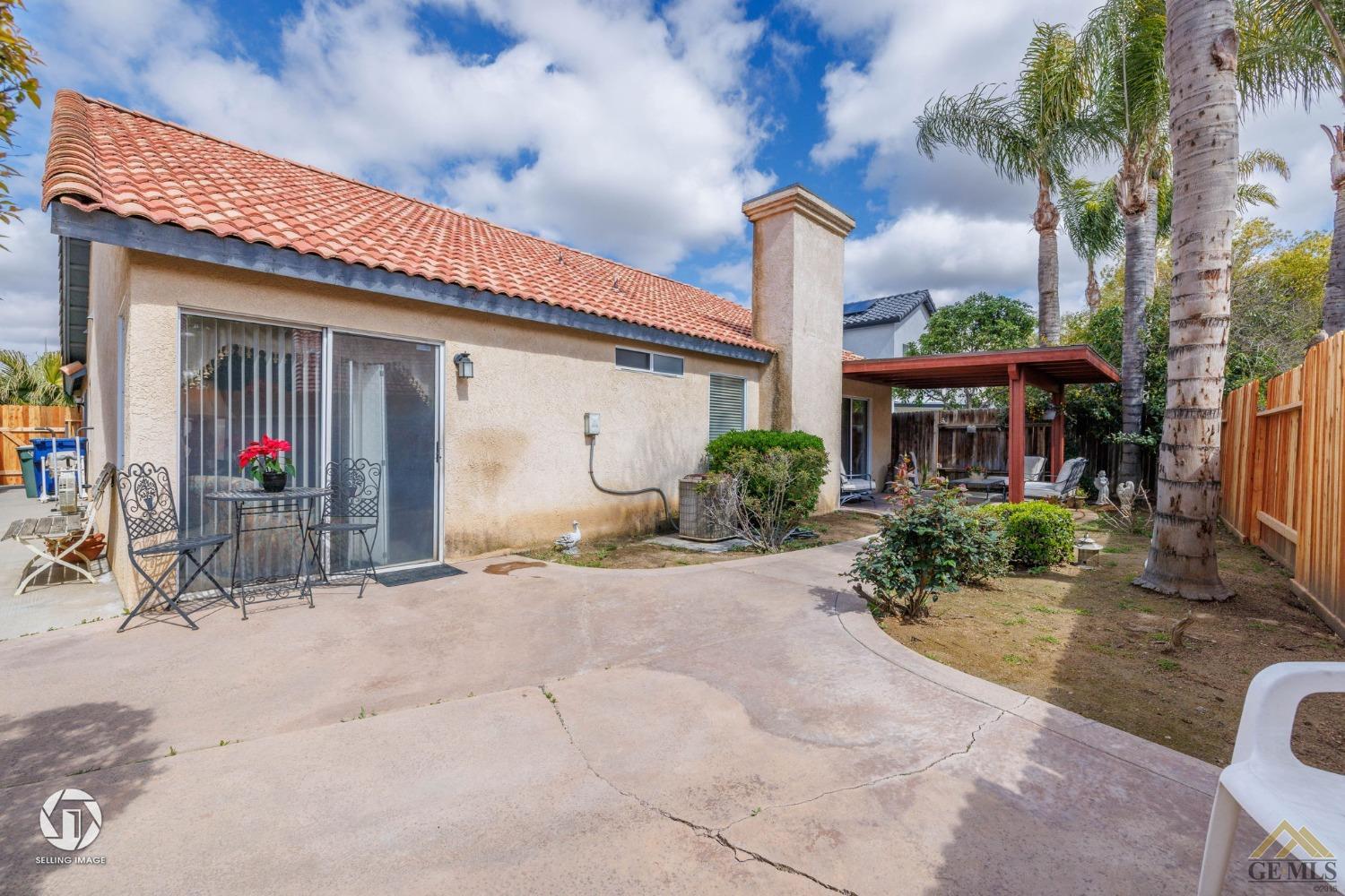 Undisclosed Address Bakersfield, CA 93312 - Photo 22 of 33 a view of a building with sitting area
