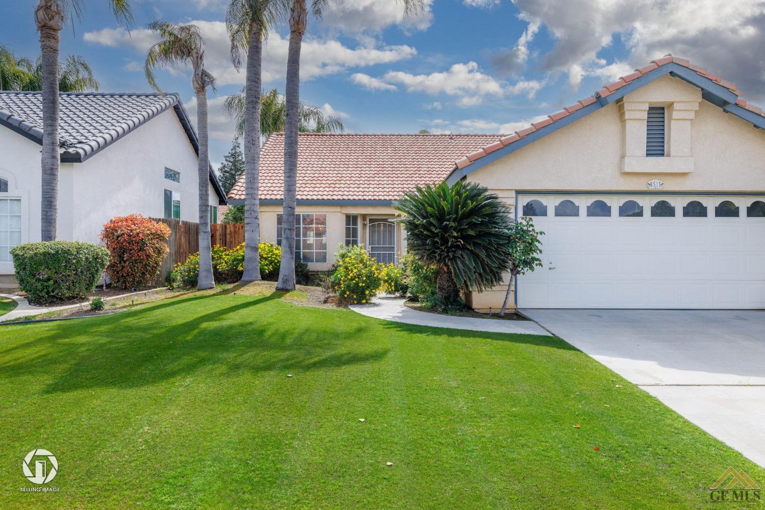 Undisclosed Address Bakersfield, CA 93312 - Photo 28 of 33 a front view of a house with garden