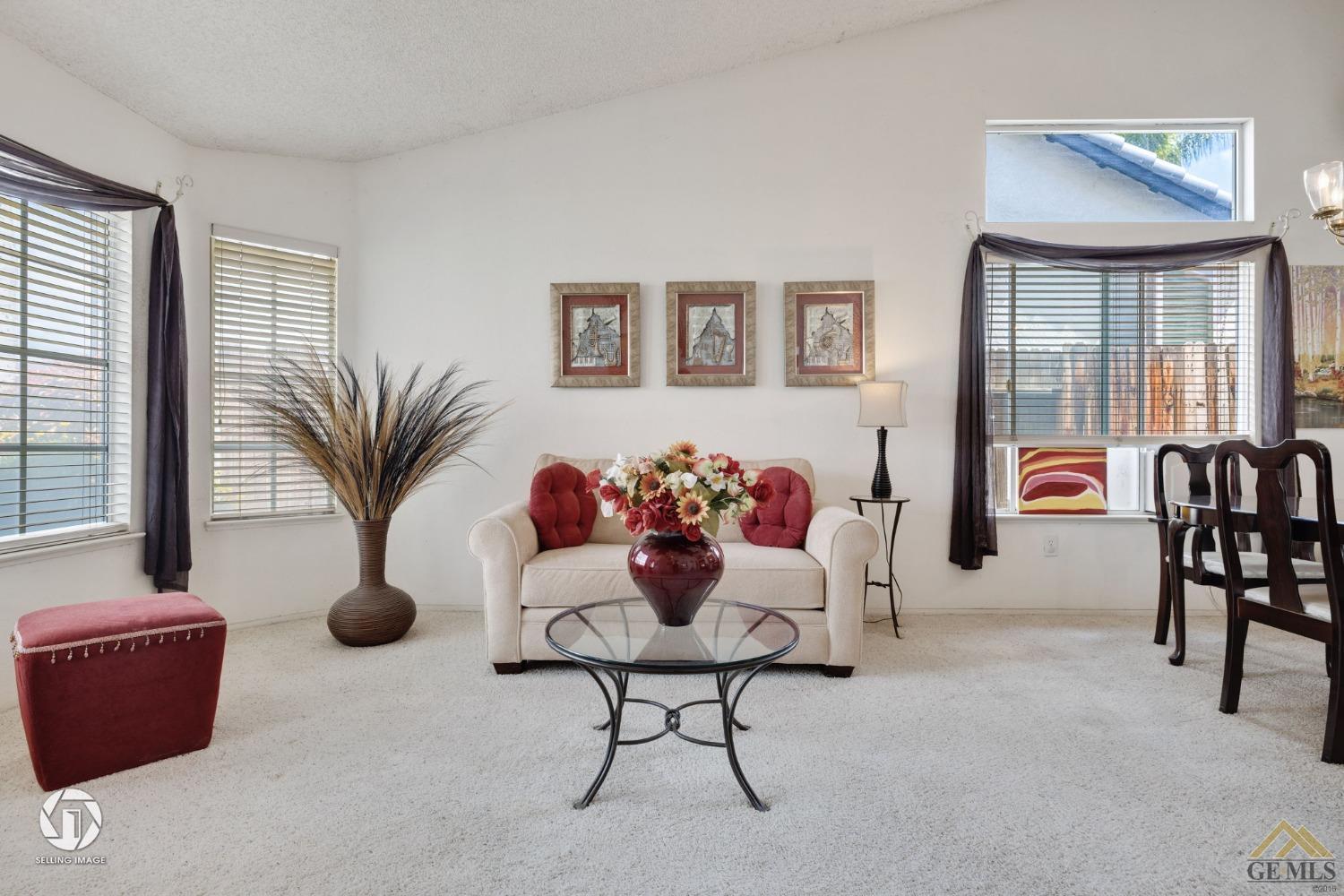 Undisclosed Address Bakersfield, CA 93312 - Photo 30 of 33 a living room with furniture potted plant and a window