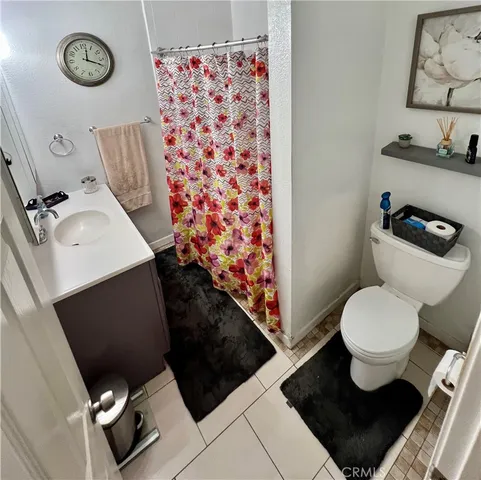 a bathroom with a toilet and a sink