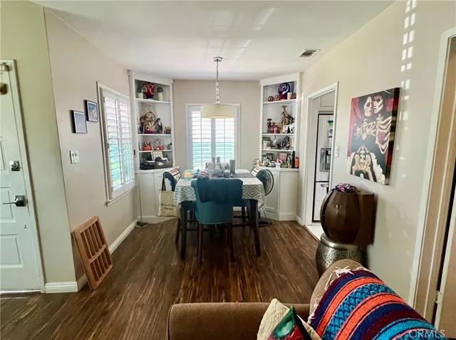 a view of a workspace with furniture and lounge chair
