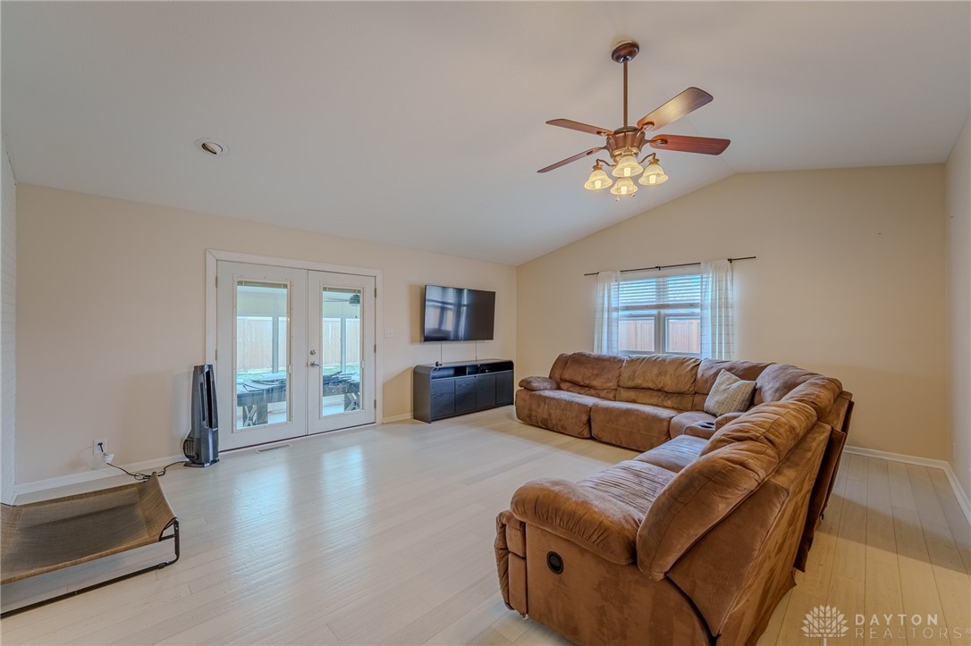 305 South Vandemark Road Sidney, OH 45365 - Photo 23 of 32 This bright living area features abundant light and vaulted ceilings.