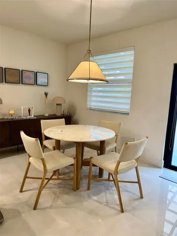 a dining room table in a room