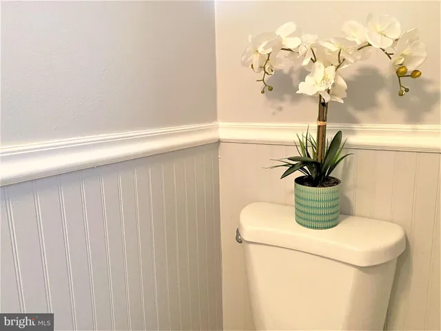 a vase of flowers sitting on a table