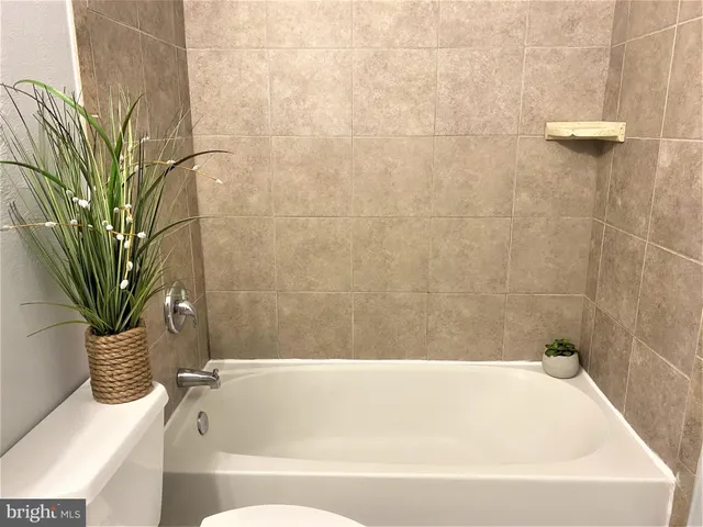 a bathroom with a bathtub