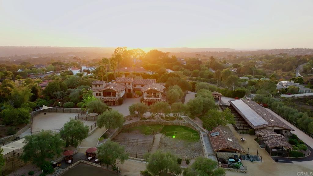 Undisclosed Address Encinitas, CA 92024 - Photo 1 of 30 an aerial view of residential house with parking and trees