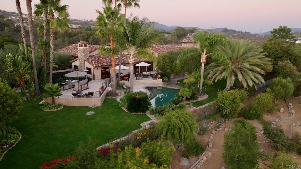 Undisclosed Address Encinitas, CA 92024 - Photo 14 of 30 a view of a house with a garden