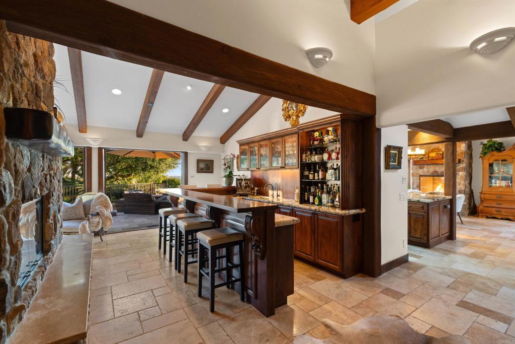 Undisclosed Address Encinitas, CA 92024 - Photo 19 of 30 a view of a dining room with furniture window and outside view