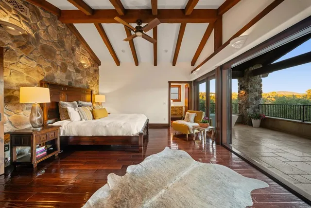 a view of living room with furniture and flat screen tv