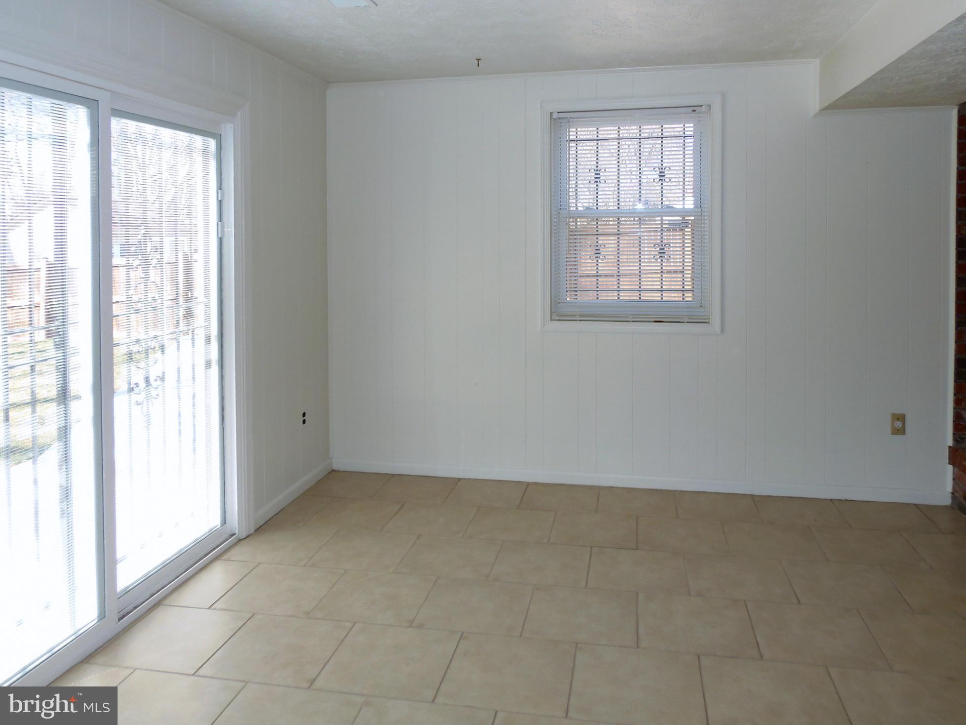 9560 North Laurel Road Laurel, MD 20723 - Photo 21 of 30 Family Room Slider to Back Yard