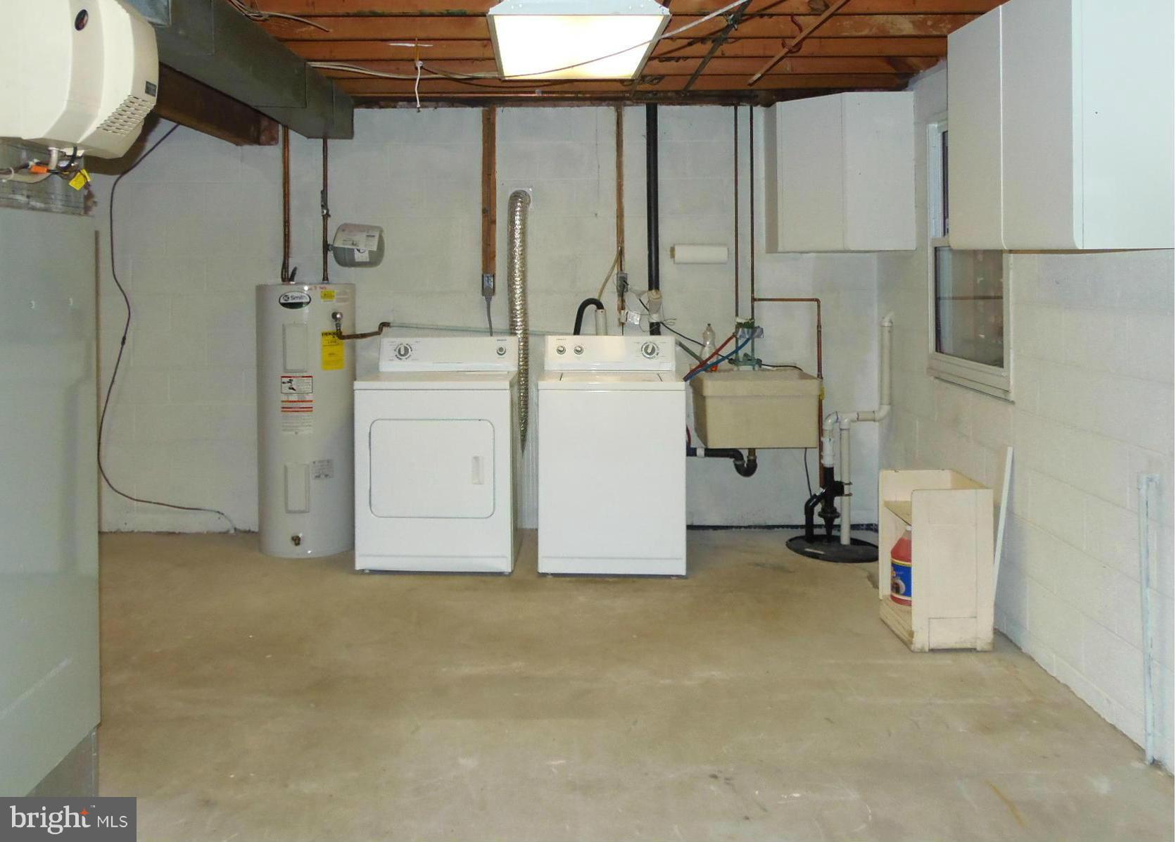 9560 North Laurel Road Laurel, MD 20723 - Photo 24 of 30 Basement Laundry w/ Work Sink