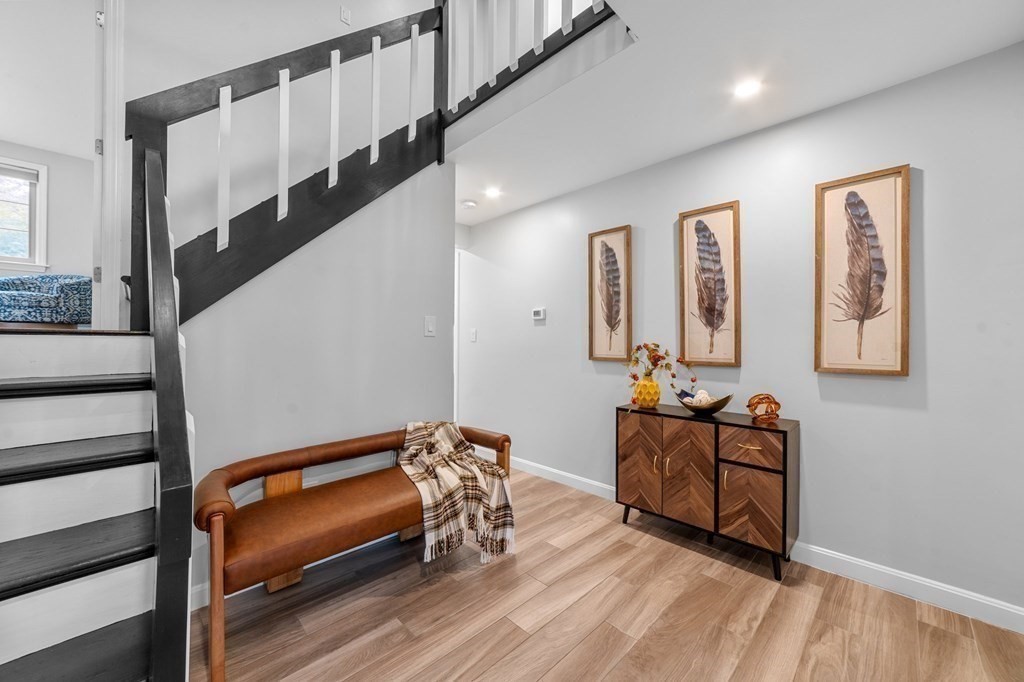 38 Wayside Lane Ashland, MA 01721 - Photo 15 of 40 a bedroom with furniture and wooden floor