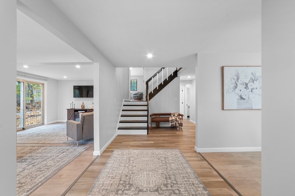 38 Wayside Lane Ashland, MA 01721 - Photo 16 of 40 a view of entryway and hall with wooden floor