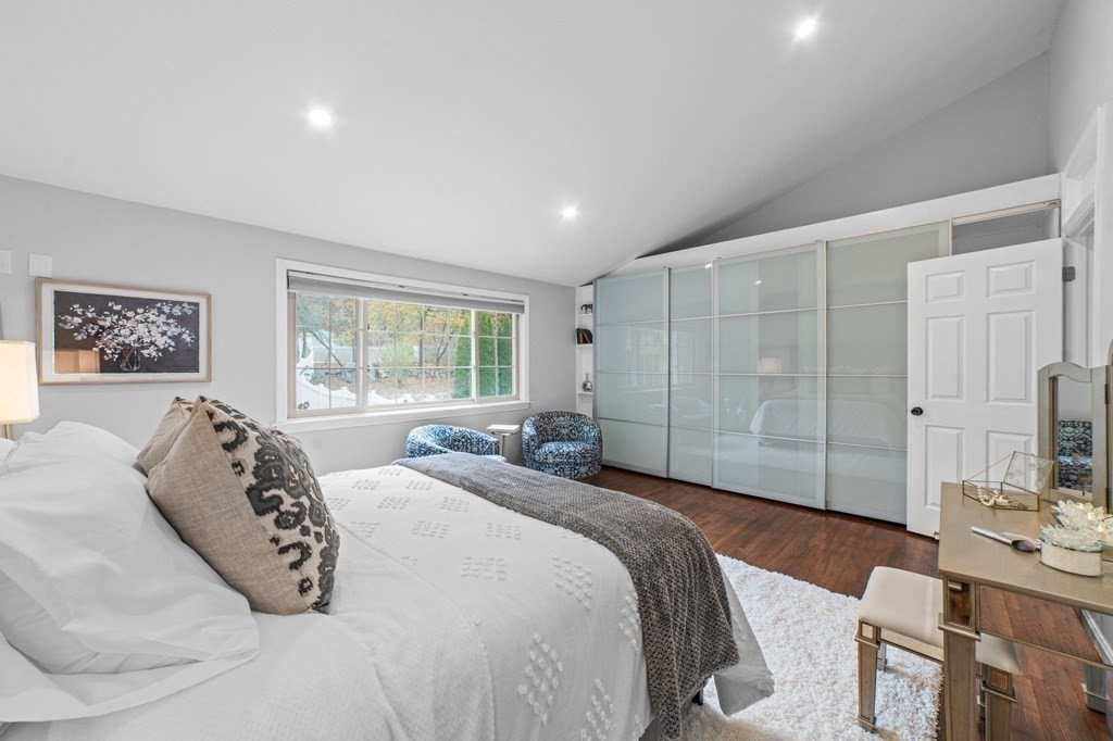 38 Wayside Lane Ashland, MA 01721 - Photo 19 of 40 a bedroom with a bed a table and chair