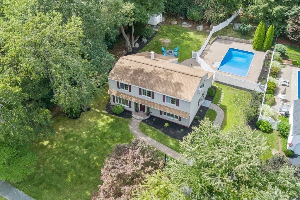38 Wayside Lane Ashland, MA 01721 - Photo 2 of 40 a view of house with backyard and trees
